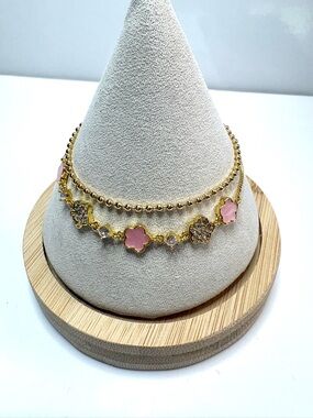 Two dainty 18k gold filled bracelets! Base is stainless steel.